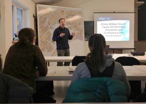 An instructor teaches vessel crews about the tanker oil spill contingency plan during the Cordova training last Spring. Photo by Serena Lopez.