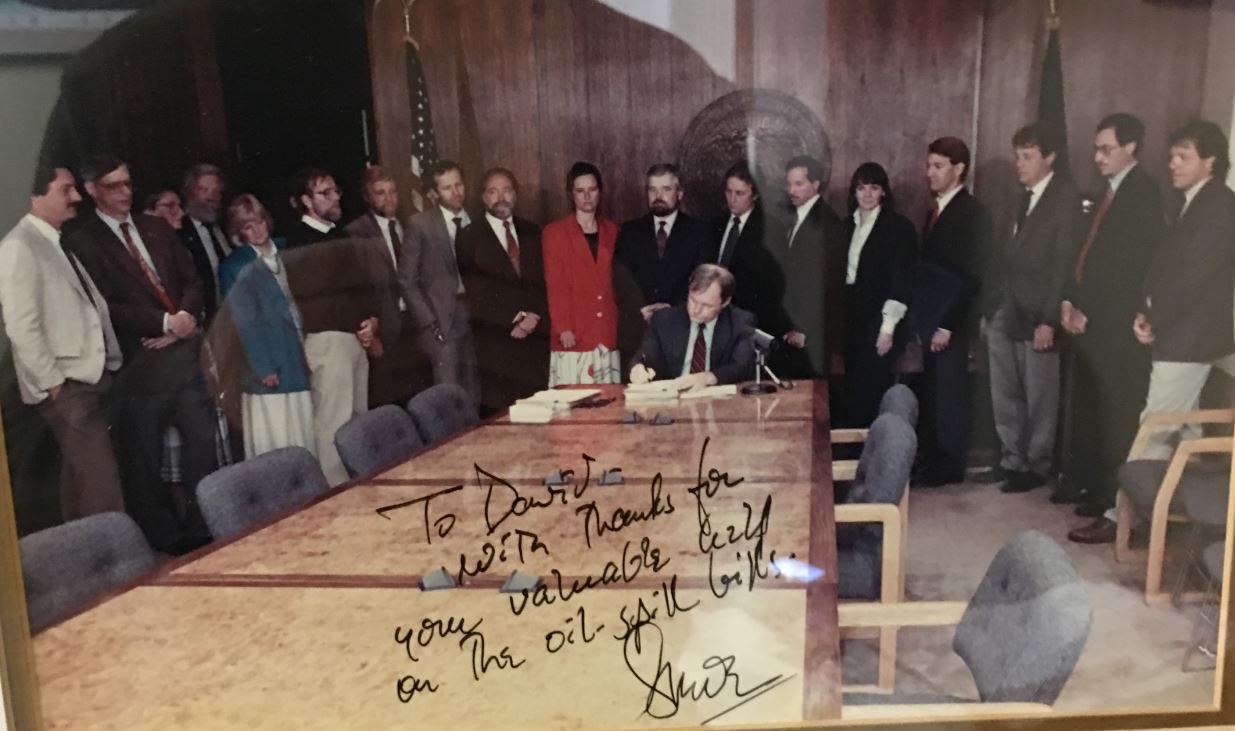Governor Steve Cowper signs into law a suite of bills developed to enhance Alaska’s oil spill preparedness in the wake of the Exxon Valdez oil spill. Photo courtesy of David Rogers
