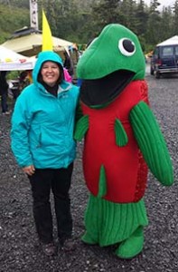 Lisa Matlock makes a new friend at the 2014 Copper River Wild! festival in Cordova.