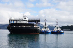Photo of two of the new Edison Chouest tugs, and an an oil spill response barge who were participating in the training.