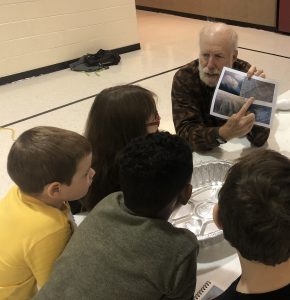 Jim Herbert, resident of Homer and member of the Oil Spill Prevention and Response Committee, shares a lesson on oil spill response. 