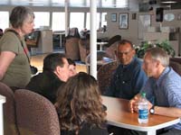 In 2010, Linda Robinson, standing, helped facilitate meetings between citizens who had been affected by the Deepwater Horizon oil spill and Alaskans who were impacted by the Exxon Valdez spill.