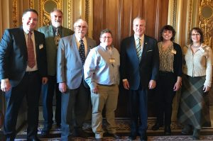 Photo of the Council delegation meeting with Sen. Dan Sullivan.